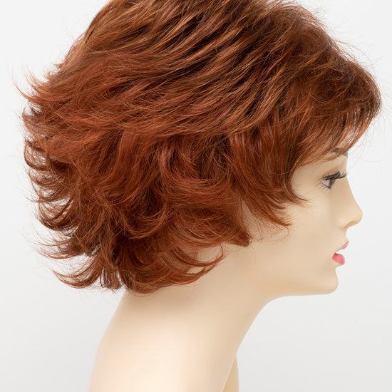 profile side of a short Kinner Beauty Wigs wig for woman on mannequin head 