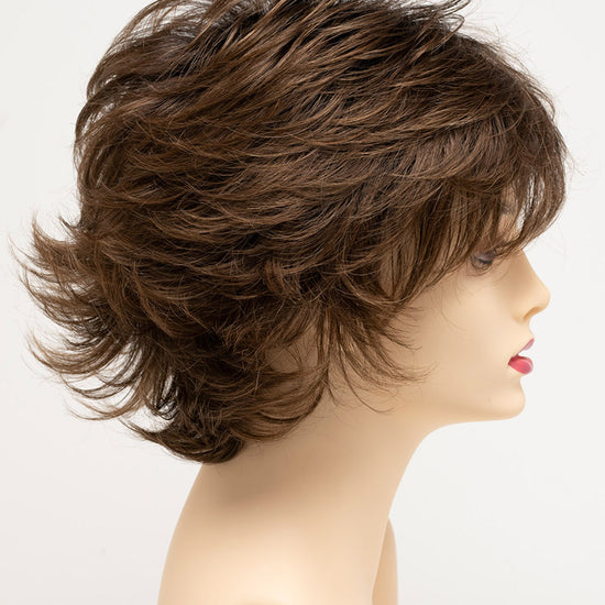 profile side of a short Kinner Beauty Wigs wig for woman on mannequin head 