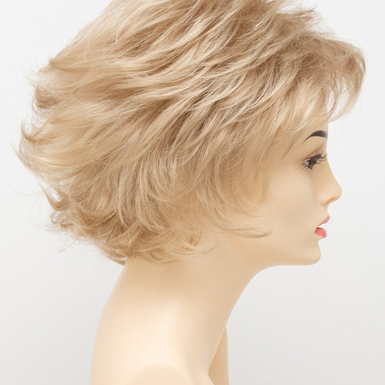 profile side of a short Kinner Beauty Wigs wig for woman on mannequin head 