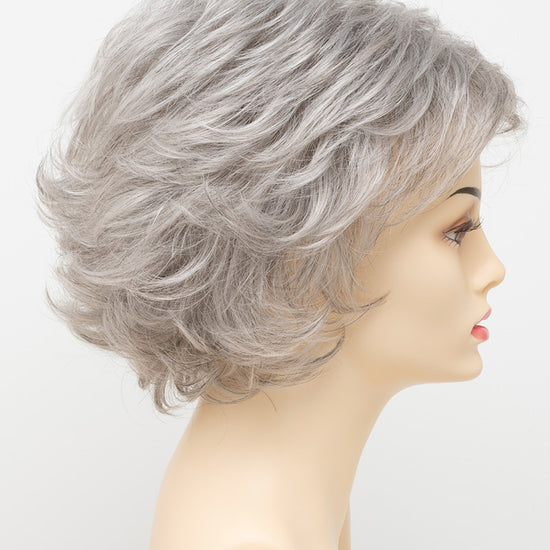 profile side of a short Kinner Beauty Wigs wig for woman on mannequin head 