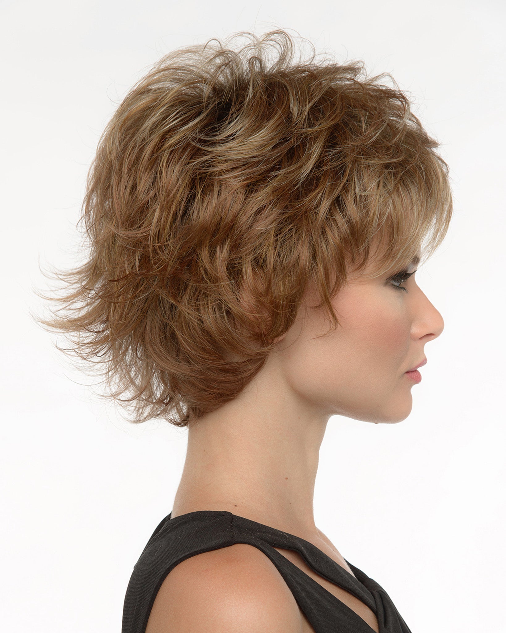 profile side of a short Kinner Beauty Wigs wig on woman head 