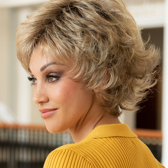 profile side of a short Kinner Beauty Wigs wig on woman head 