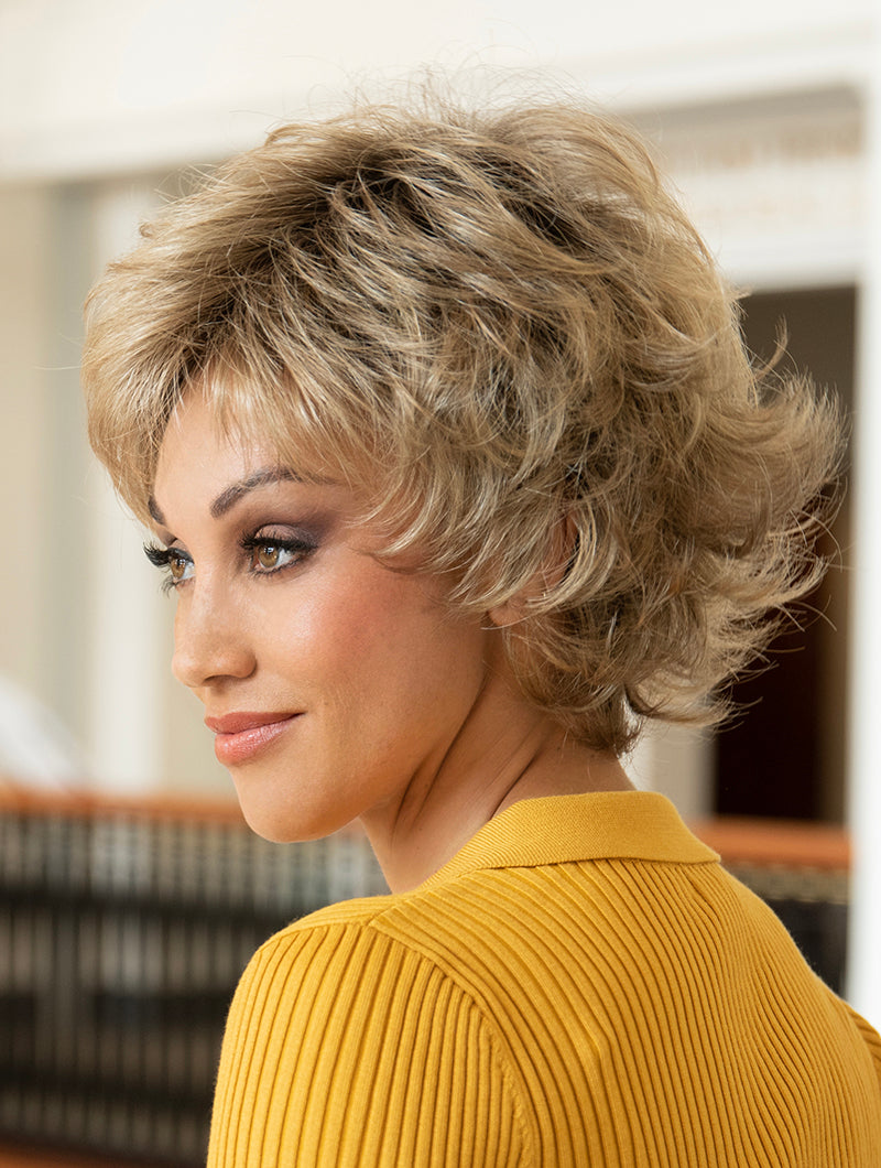 profile side of a short Kinner Beauty Wigs wig on woman head 