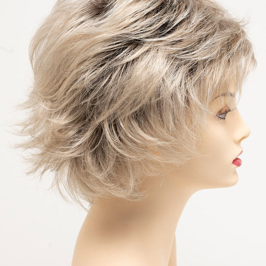 profile side of a short Kinner Beauty Wigs wig for woman on mannequin head 