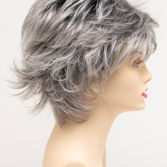 profile side of a short Kinner Beauty Wigs wig for woman on mannequin head 