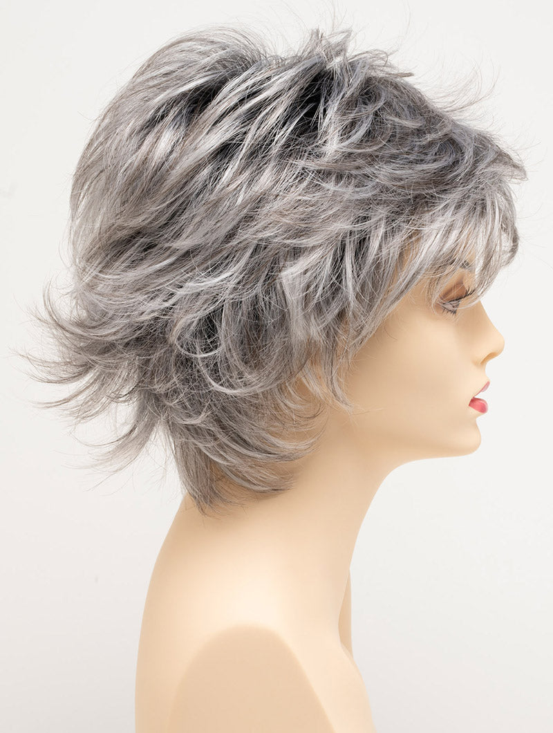 profile side of a short Kinner Beauty Wigs wig for woman on mannequin head 