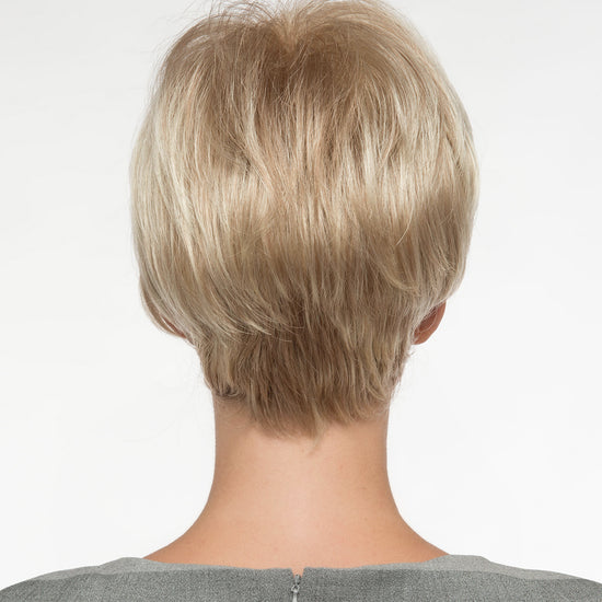 back side of a short Kinner Beauty Wigs wig on woman head 