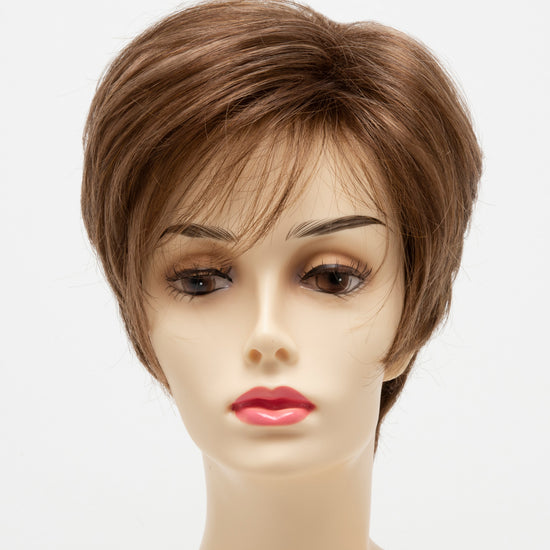 front side of a short Kinner Beauty Wigs wig for woman on mannequin head 