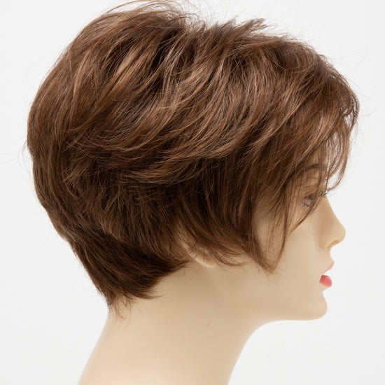 profile side of a short Kinner Beauty Wigs wig for woman on mannequin head 