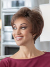 profile side of a short Kinner Beauty Wigs wig on woman head 