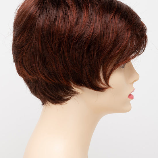 profile side of a short Kinner Beauty Wigs wig for woman on mannequin head 