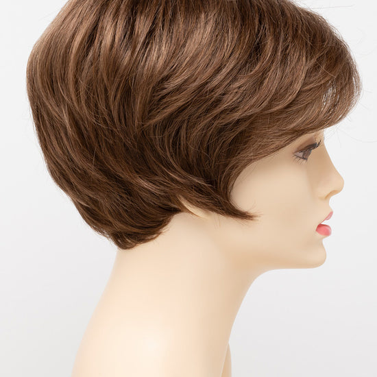 profile side of a short Kinner Beauty Wigs wig for woman on mannequin head 