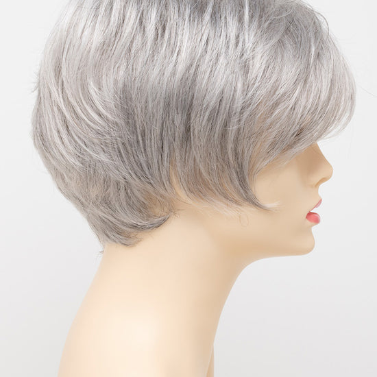 profile side of a short Kinner Beauty Wigs wig for woman on mannequin head 