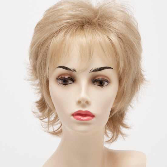 front side of a short Kinner Beauty Wigs wig for woman on mannequin head 