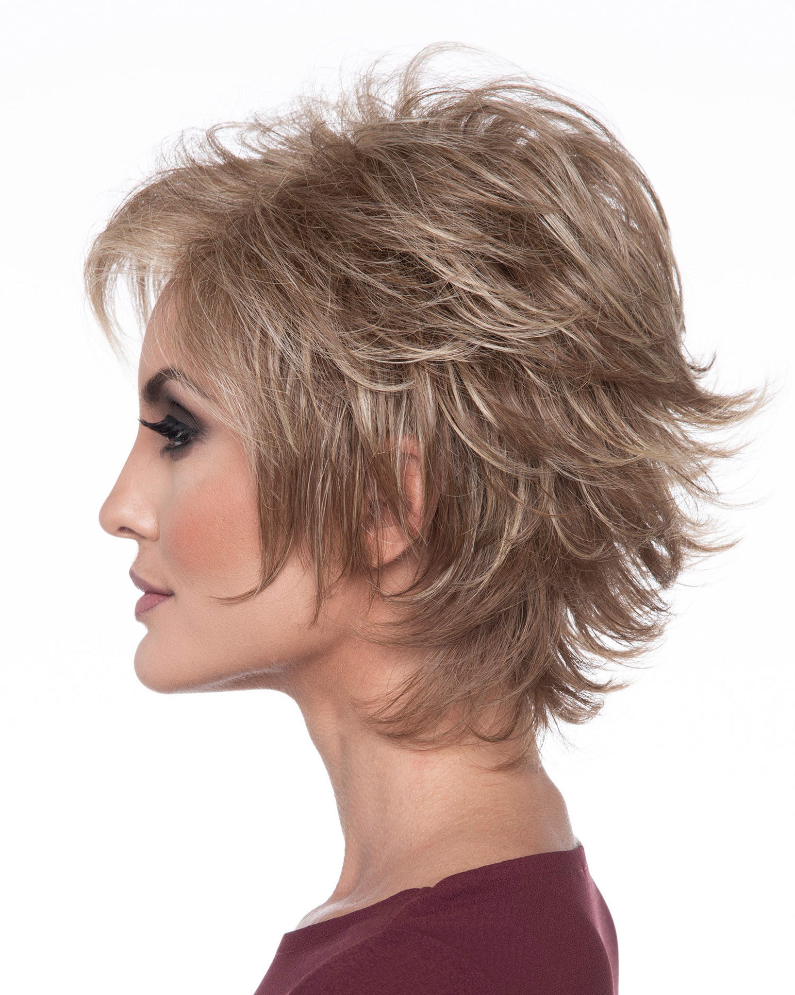 profile side of a short Kinner Beauty Wigs wig on woman head 