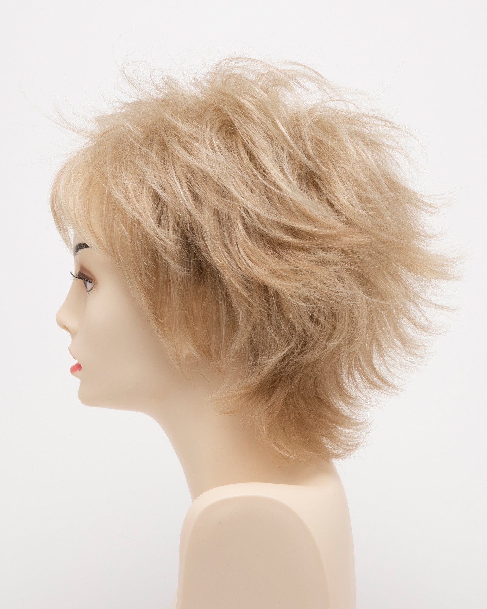 profile side of a short Kinner Beauty Wigs wig for woman on mannequin head 