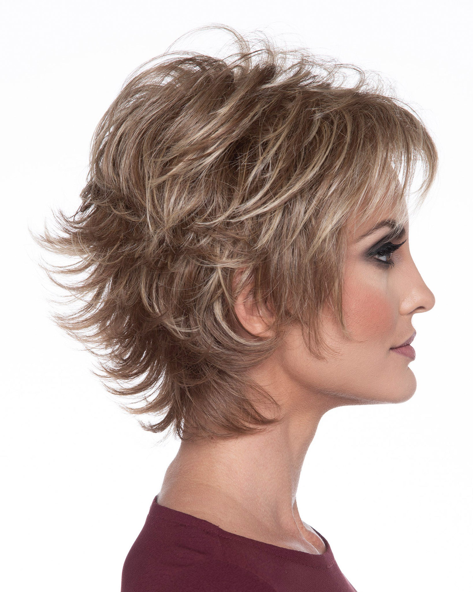 profile side of a short Kinner Beauty Wigs wig on woman head 