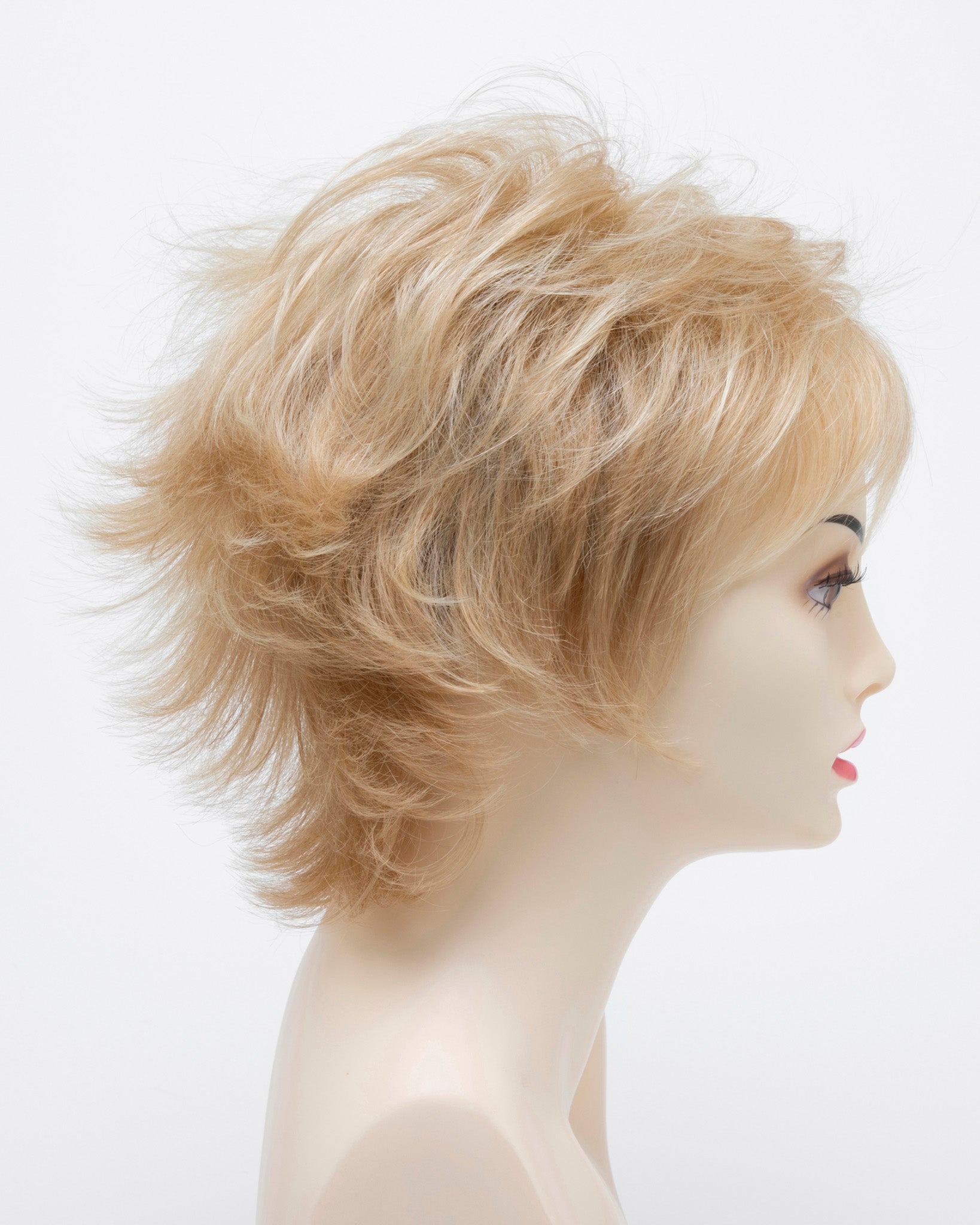 profile side of a short Kinner Beauty Wigs wig for woman on mannequin head 