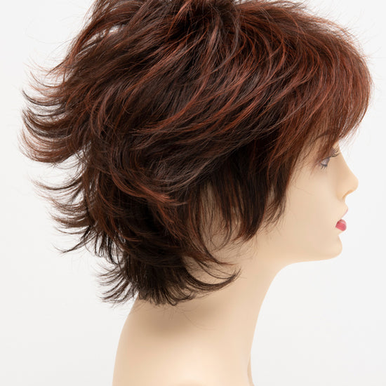 profile side of a short Kinner Beauty Wigs wig for woman on mannequin head 