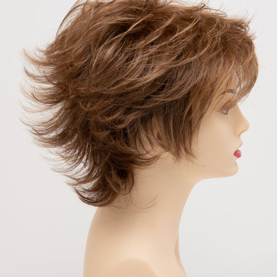 profile side of a short Kinner Beauty Wigs wig for woman on mannequin head 