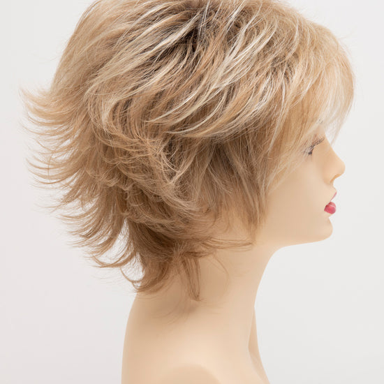 profile side of a short Kinner Beauty Wigs wig for woman on mannequin head 