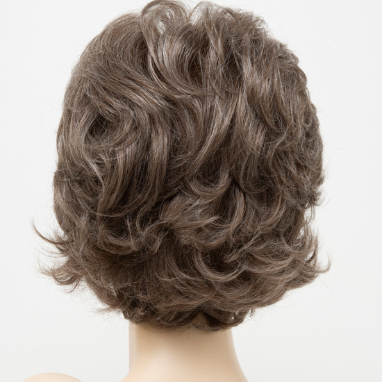 back side of a short wig Kinner Beauty Wigs for woman on mannequin head 