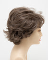 profile side of a short Kinner Beauty Wigs wig for woman on mannequin head 