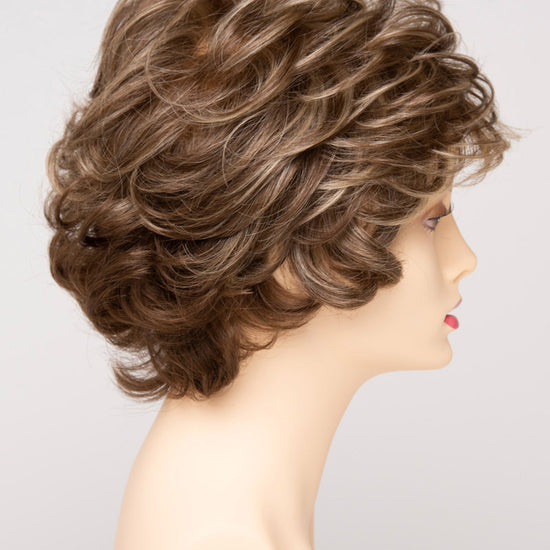 profile side of a short Kinner Beauty Wigs wig for woman on mannequin head 