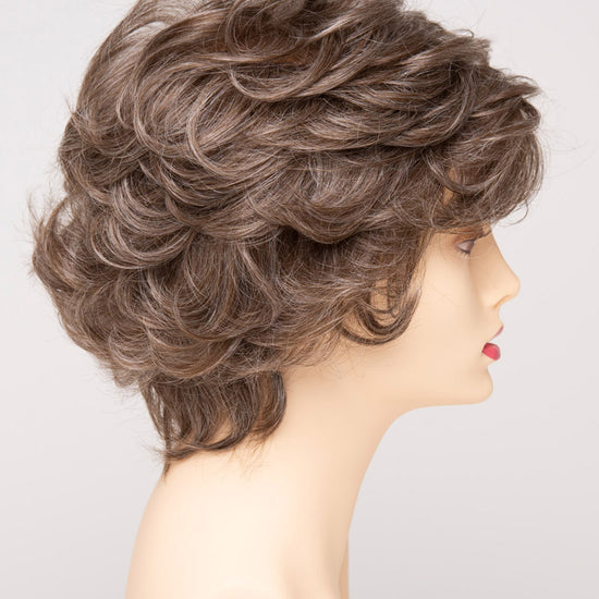 profile side of a short Kinner Beauty Wigs wig for woman on mannequin head 