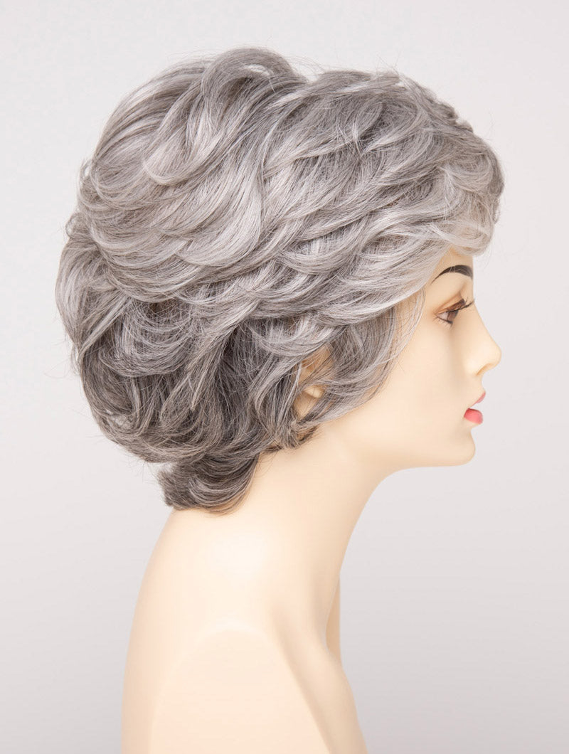 profile side of a short Kinner Beauty Wigs wig for woman on mannequin head 