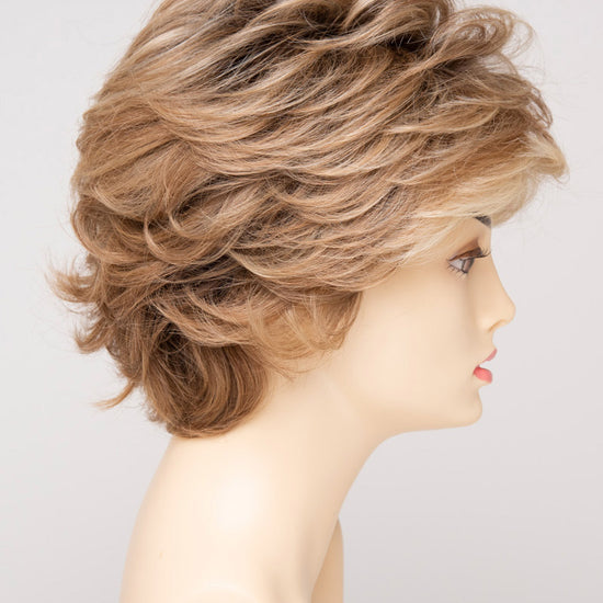 profile side of a short Kinner Beauty Wigs wig for woman on mannequin head 