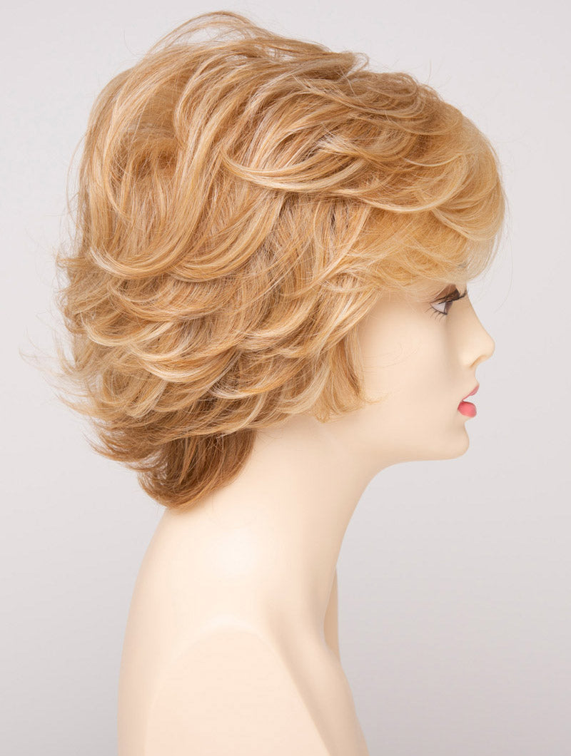 profile side of a short Kinner Beauty Wigs wig for woman on mannequin head 