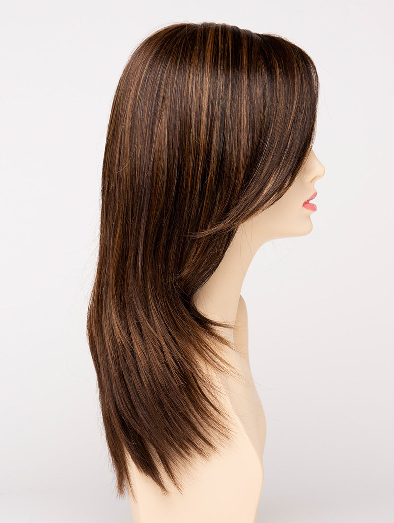 profile side of a long Kinner Beauty Wigs wig for woman on mannequin head 