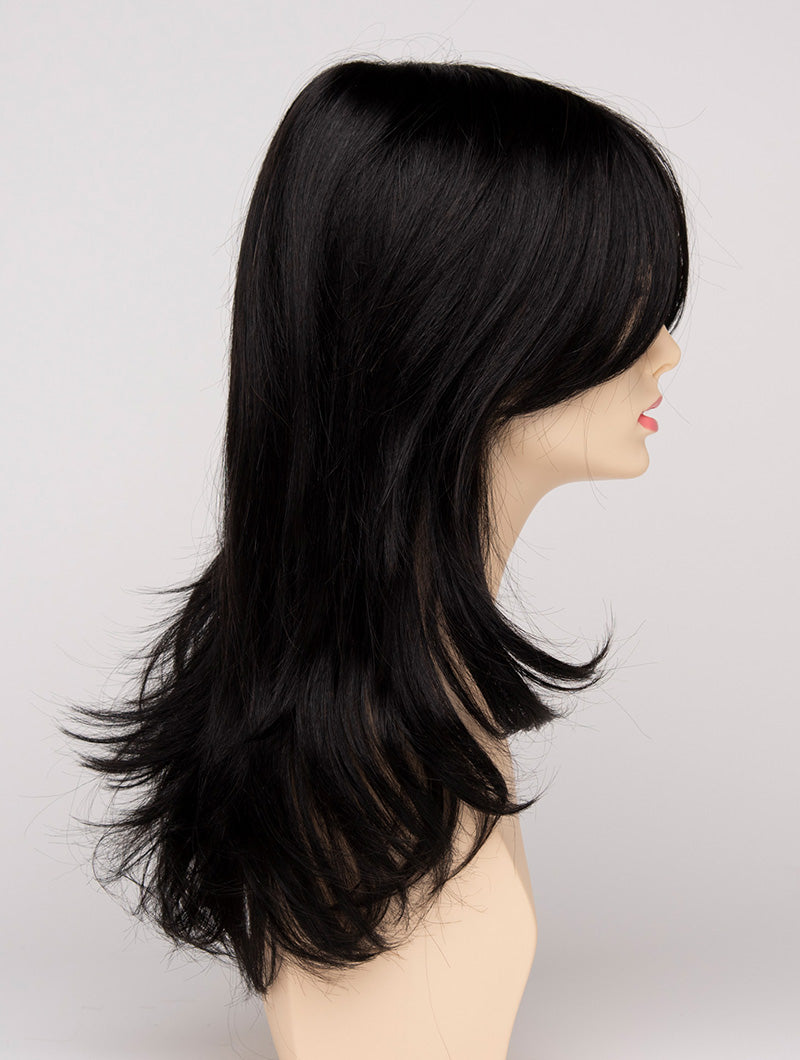 profile side of a long Kinner Beauty Wigs wig for woman on mannequin head 