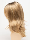 profile side of a long Kinner Beauty Wigs wig for woman on mannequin head 