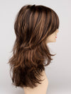 profile side of a long Kinner Beauty Wigs wig for woman on mannequin head 