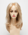 front side of a long Kinner Beauty Wigs wig for woman on mannequin head 