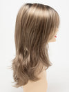 profile side of a long Kinner Beauty Wigs wig for woman on mannequin head 