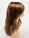 profile side of a long Kinner Beauty Wigs wig for woman on mannequin head 