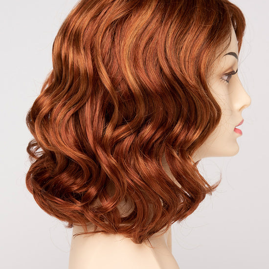 profile side of a medium Kinner Beauty Wigs wig for woman on mannequin head 