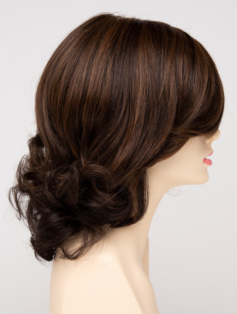 profile side of a medium Kinner Beauty Wigs wig for woman on mannequin head 