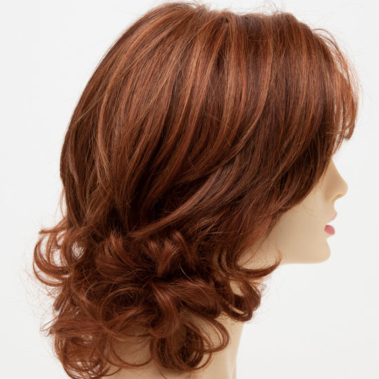 profile side of a medium Kinner Beauty Wigs wig for woman on mannequin head 