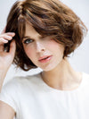 offer a Cancer Kinship Kinner beauty wig to a woman