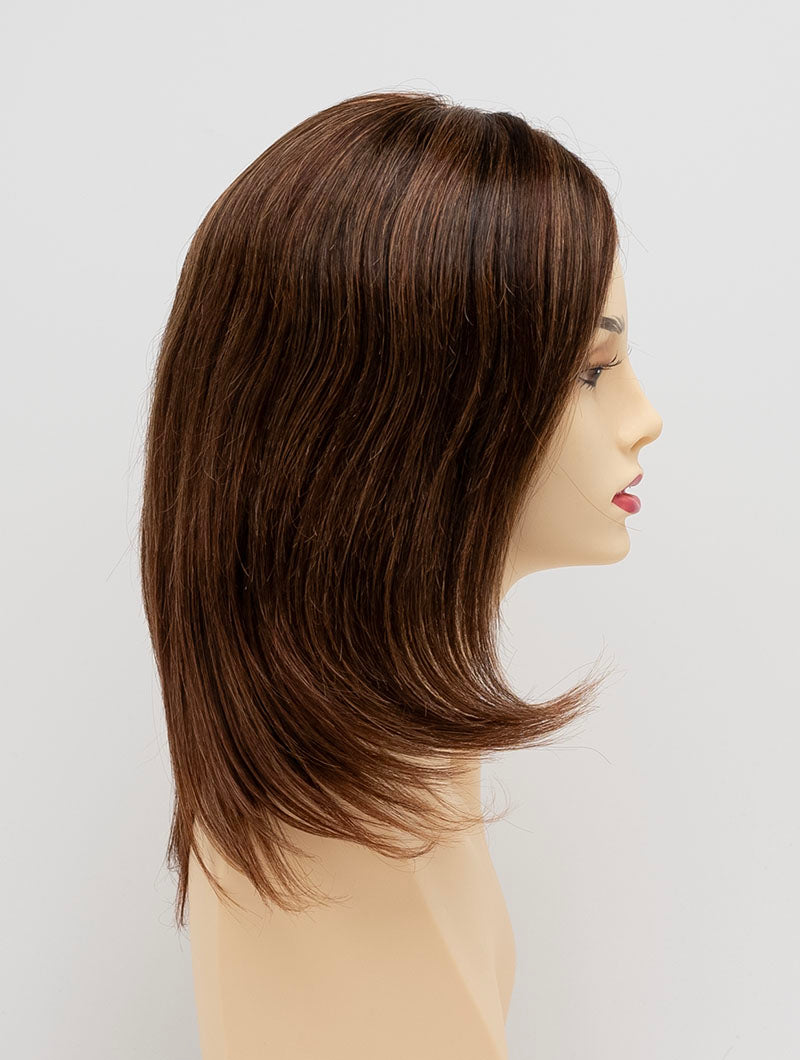 profile side of a medium Kinner Beauty Wigs wig for woman on mannequin head 