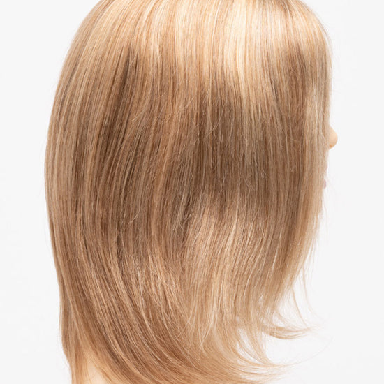 profile side of a medium Kinner Beauty Wigs wig for woman on mannequin head 