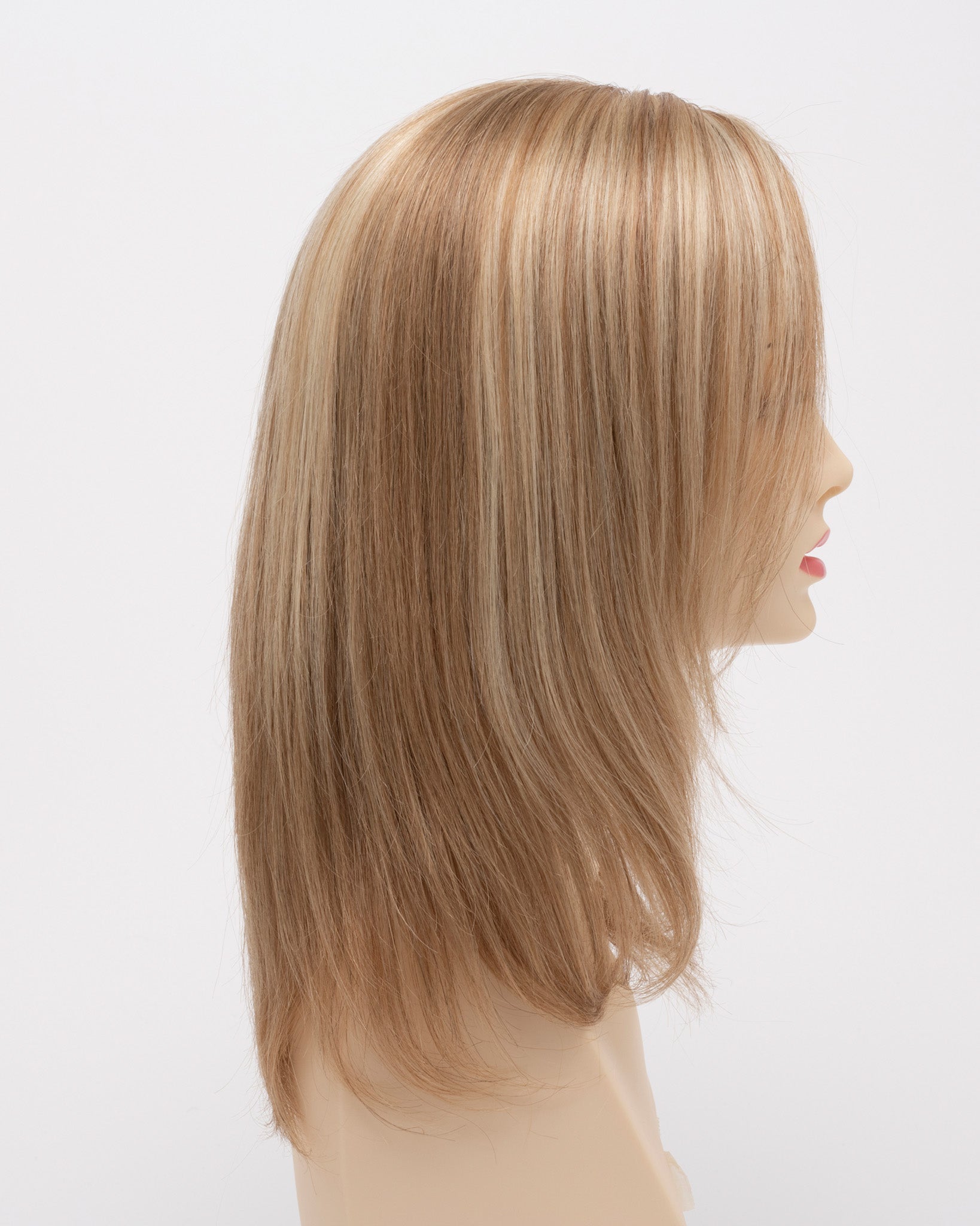 profile side of a medium Kinner Beauty Wigs wig for woman on mannequin head 