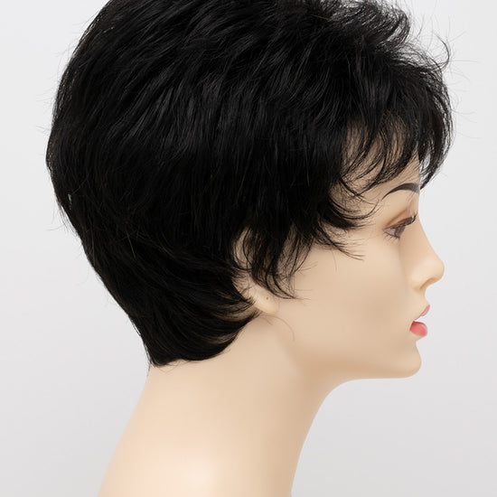 profile side of a short Kinner Beauty Wigs wig on woman head 