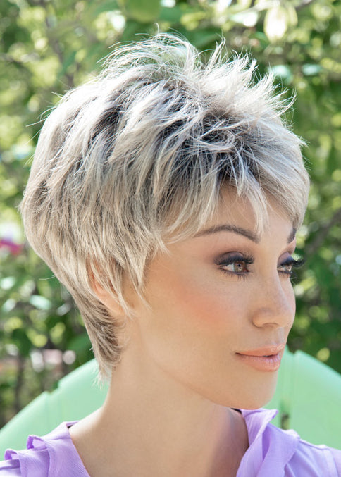 profile side of a short Kinner Beauty Wigs wig for woman on mannequin head 