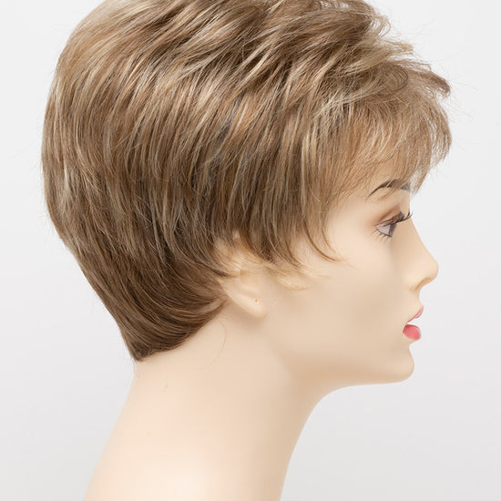 profile side of a short Kinner Beauty Wigs wig on woman head 