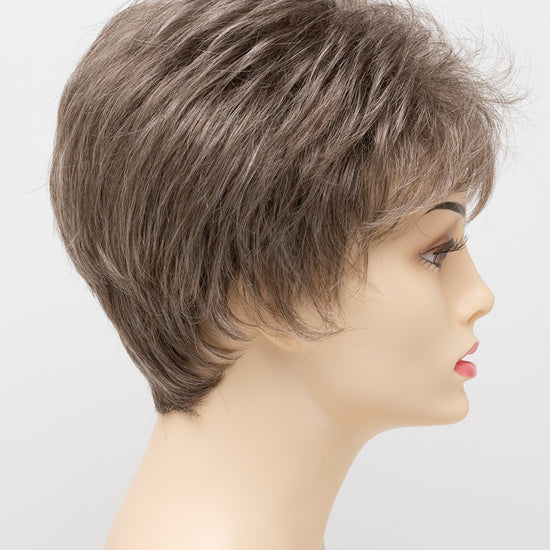 profile side of a short Kinner Beauty Wigs wig on woman head 